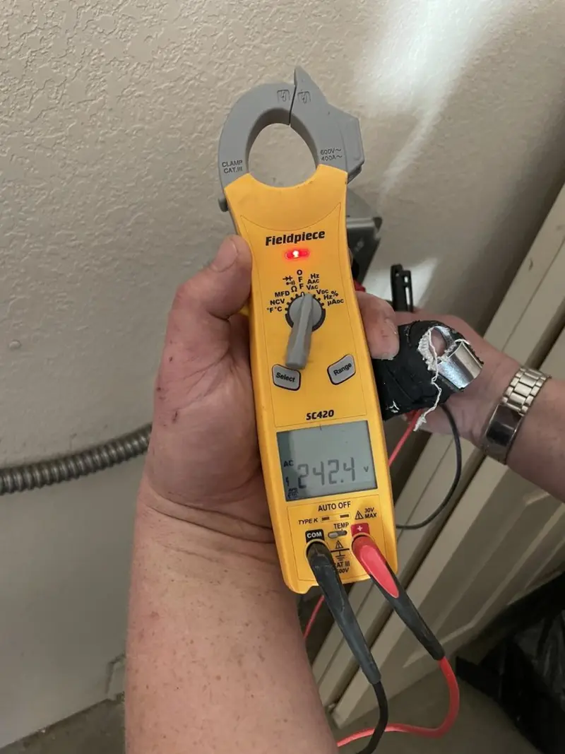 Voltage testing with clamp meter during Aluminum Wiring Replacement in Carmel
